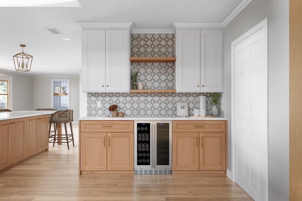 Bright two-tone kitchen with white uppers and natural lowers